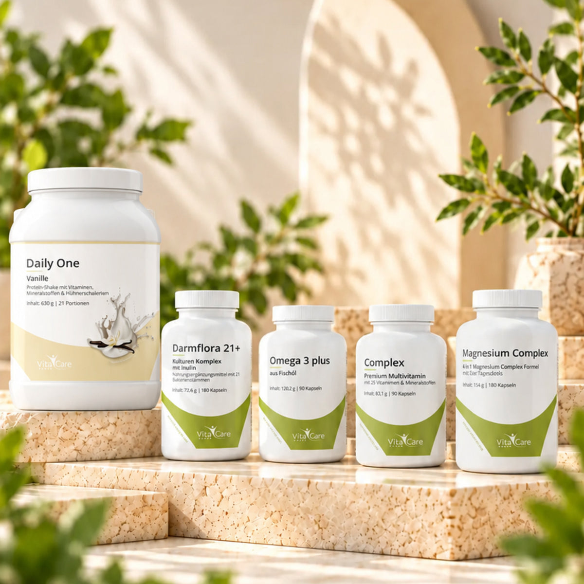 VitaCare Produkte auf hellen Steinpodesten